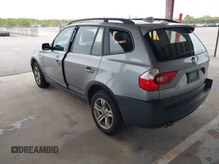 2005 BMW X3 3.0i with VIN WBXPA93495WD18319, listed as a IAAI auction lot 41906633 with 185,090 mi miles. Bid and sale history available at carsss.com. Image 3.