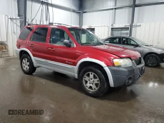 2005 Ford Escape Hybrid с VIN 1FMYU96H75KD76792, выставлен на аукционе Copart как лот 66097344 с пробегом 227 214 миль миль и Списание • Salvage title. История ставок и продаж доступна на DreamBid. Изображение 4.