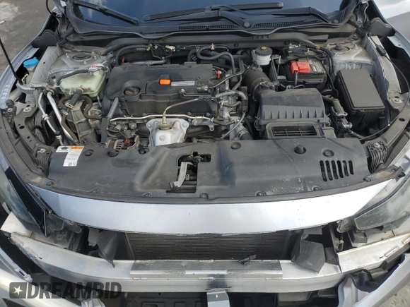 2019 Honda Civic LX with VIN 2HGFC2F69KH567767, listed as a Copart auction lot 52069575 with 102,259 mi miles and Non Repairable. Bid and sale history available at DreamBid. Image 13.