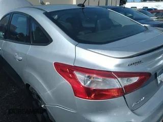2013 Ford Focus SE with VIN 1FADP3F26DL235990, listed as a IAAI auction lot 41759160 with 120,715 mi miles. Bid and sale history available at carsss.com. Image 3.
