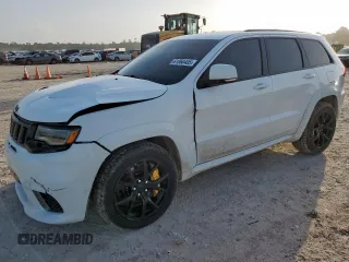 2018 Jeep Grand Cherokee Trackhawk with VIN 1C4RJFN98JC314414, listed as a Copart auction lot 61060405 with 57,458 mi miles and Salvage title. Bid and sale history available at DreamBid. Image 1.