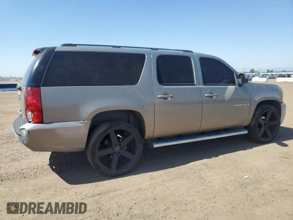 2007 GMC Yukon XL SLT z VIN 1GKFK16317J189987, wystawiony jako Copart lot #62029895 z przebiegiem 192 166 mil mil oraz Czysty tytuł • Clean title. Historia ofert i sprzedaży dostępna na DreamBid. Obrazek 3.