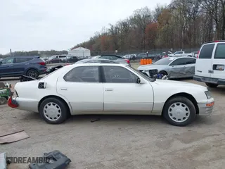 1996 Lexus LS 400 with VIN JT8BH22F8T0039047, listed as a IAAI auction lot 41883243 with 185,921 mi miles. Bid and sale history available at carsss.com. Image 12.