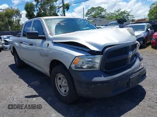 2014 Ram 1500 Tradesman with VIN 1C6RR6ST5ES414000, listed as a IAAI auction lot 41949482 with 95,868 mi miles and . Bid and sale history available at DreamBid. Image 1.