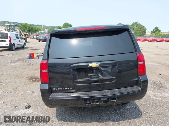 2015 Chevrolet Suburban LT with VIN 1GNSKJKC4FR222178, listed as a IAAI auction lot 42423080 with 234,870 mi miles and . Bid and sale history available at DreamBid. Image 16.