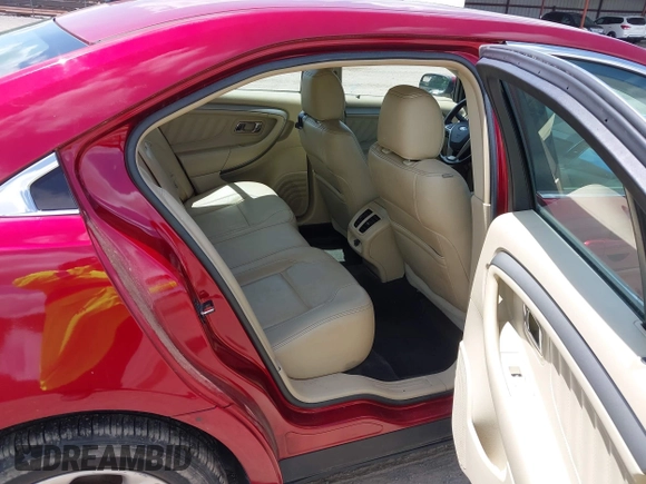 2014 Ford Taurus SEL z VIN 1FAHP2E89EG126922, wystawiony jako IAAI lot #42236235 z przebiegiem 176 917 mil mil oraz . Historia ofert i sprzedaży dostępna na DreamBid. Obrazek 8.
