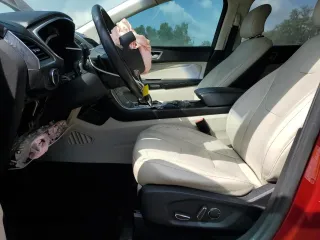 2015 Ford Edge Titanium z VIN 2FMPK3K81FBB11530, wystawiony jako Copart lot #57769795 z przebiegiem 108 844 mil mil oraz Szkoda całkowita • Salvage title. Historia ofert i sprzedaży dostępna na DreamBid. Obrazek 7.