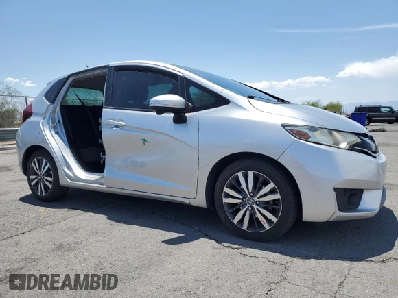 2016 Honda Fit EX with VIN JHMGK5H79GX020531, listed as a Copart auction lot 60224965 with 98,295 mi miles and Salvage title. Bid and sale history available at DreamBid. Image 4.