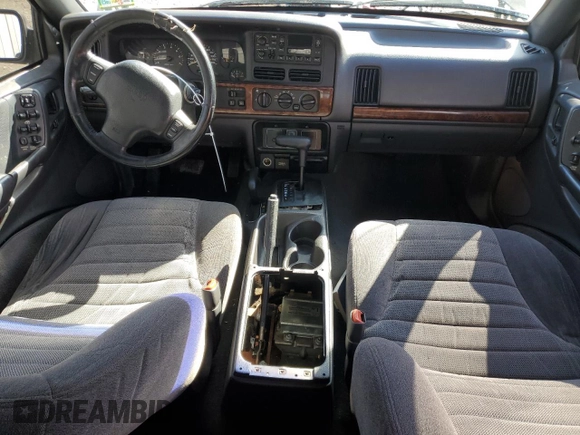 1997 Jeep Grand Cherokee Laredo with VIN 1J4GZ58SXVC569171, listed as a Copart auction lot 45657745 with 101,648 mi miles and Salvage Title. Bid and sale history available at carsss.com. Image 8.
