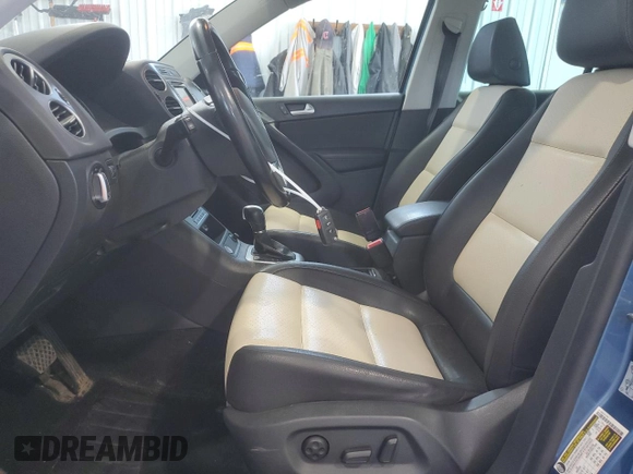2017 Volkswagen Tiguan Wolfsburg Edition with VIN WVGSV7AX8HK014738, listed as a Copart auction lot 62255775 with 123,768 mi miles and Salvage title. Bid and sale history available at DreamBid. Image 7.