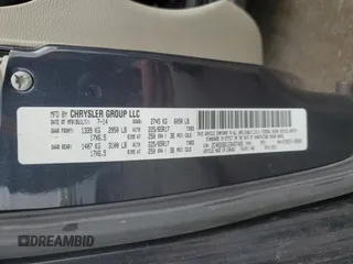 2014 Dodge Grand Caravan SE 30th Anniversary with VIN 2C4RDGBG1ER457489, listed as a Copart auction lot 54301225 with 157,740 mi miles and Salvage Title. Bid and sale history available at DreamBid. Image 14.