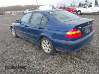 2004 BMW 3 Series 325i with VIN WBAET37414NH06040, listed as a IAAI auction lot 41793260 with 212,541 mi miles. Bid and sale history available at carsss.com. Image 3.