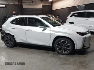 2024 Lexus UX 250h Premium z VIN JTHP9JBH5R2071157, wystawiony jako IAAI lot #42314505 z przebiegiem 15 803 mil mil oraz . Historia ofert i sprzedaży dostępna na DreamBid. Obrazek 14.