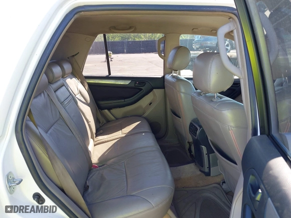2003 Toyota 4Runner SR5 with VIN JTEZU14R038009325, listed as a IAAI auction lot 42031464 with 282,463 mi miles. Bid and sale history available at carsss.com. Image 8.