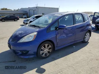 2009 Honda Fit Sport w/Navi with VIN JHMGE88639S037082, listed as a Copart auction lot 53303755 with 213,931 mi miles and Salvage Title. Bid and sale history available at carsss.com. Image 1.