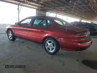 1999 Ford Taurus SE with VIN 1FAFP53S9XA297537, listed as a Copart auction lot 43862035 with 145,983 mi miles and Salvage title. Bid and sale history available at DreamBid. Image 2.