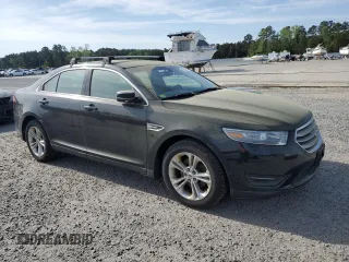 2014 Ford Taurus SEL with VIN 1FAHP2E87EG151866, listed as a Copart auction lot 52692965 with 201,680 mi miles and Clean Title. Bid and sale history available at DreamBid. Image 4.