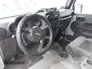 2007 Jeep Wrangler X with VIN 1J4FA24117L142513, listed as a IAAI auction lot 42314284 with 70,213 mi miles and . Bid and sale history available at DreamBid. Image 5.