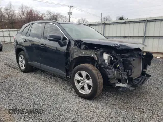2019 Toyota RAV4 XLE with VIN JTMP1RFV9KD506960, listed as a Copart auction lot 50242025 with 102,157 mi miles and Salvage Title. Bid and sale history available at DreamBid. Image 4.