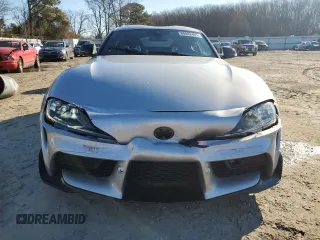 2022 Toyota Supra 2.0 with VIN WZ1DB2C08NW050265, listed as a Copart auction lot 88882465 with 14,576 mi miles and Salvage title. Bid and sale history available at DreamBid. Image 5.
