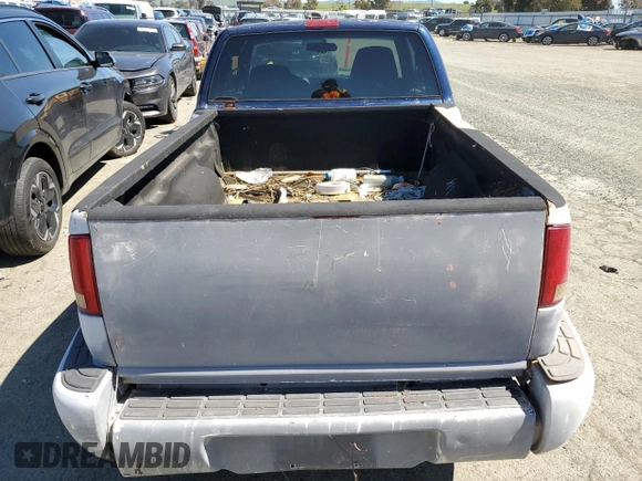 2000 GMC Sonoma SLS z VIN 1GTCS19W0Y8206050, wystawiony jako Copart lot #49122164 z przebiegiem 264 070 mil mil oraz Szkody całkowita. Historia ofert i sprzedaży dostępna na DreamBid. Obrazek 10.