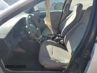 2000 Saturn SL with VIN 1G8ZH5289YZ253710, listed as a Copart auction lot 77904954 with Not provided miles and Non repairable. Bid and sale history available at DreamBid. Image 7.