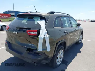 2015 Jeep Cherokee Sport with VIN 1C4PJMAB9FW595102, listed as a IAAI auction lot 42257918 with 95,059 mi miles and . Bid and sale history available at DreamBid. Image 4.