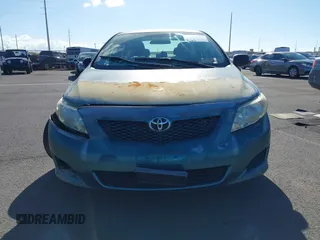 2009 Toyota Corolla with VIN 1NXBU40E39Z119288, listed as a IAAI auction lot 40477607 with 76,584 mi miles. Bid and sale history available at carsss.com. Image 11.