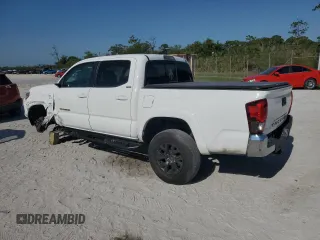 2023 Toyota Tacoma SR5 z VIN 3TMAZ5CN3PM212056, wystawiony jako Copart lot #57217735 z przebiegiem 36 533 mil mil oraz Szkoda całkowita • Salvage title. Historia ofert i sprzedaży dostępna na DreamBid. Obrazek 2.