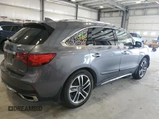 2017 Acura MDX Advance with VIN 5FRYD4H82HB001719, listed as a Copart auction lot 54055205 with 106,527 mi miles and Salvage title. Bid and sale history available at DreamBid. Image 3.