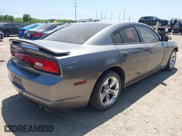 2012 Dodge Charger SE with VIN 2C3CDXBG5CH219805, listed as a IAAI auction lot 42002071 with 238,820 mi miles. Bid and sale history available at carsss.com. Image 4.