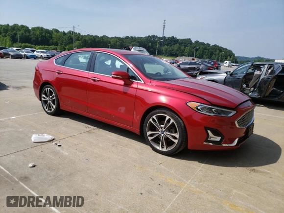 2020 Ford Fusion Titanium with VIN 3FA6P0K92LR164040, listed as a Copart auction lot 59497495 with 74,812 mi miles and Salvage title. Bid and sale history available at DreamBid. Image 4.