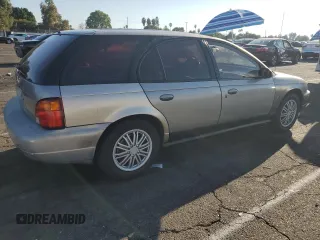 1997 Saturn SW z VIN 1G8ZK8279VZ169005, wystawiony jako Copart lot #73049694 z przebiegiem 110 215 mil mil oraz Szkody całkowita. Historia ofert i sprzedaży dostępna na DreamBid. Obrazek 3.