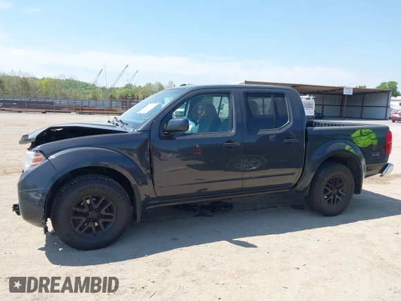 2014 Nissan Frontier SV with VIN 1N6AD0EV6EN729351, listed as a IAAI auction lot 42072768 with 149,158 mi miles and . Bid and sale history available at DreamBid. Image 14.