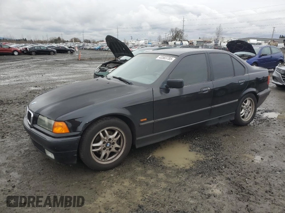 1998 BMW 3 Series 328iA with VIN WBACD4327WAV64492, listed as a Copart auction lot 43583785 with 148,128 mi miles and Salvage Title. Bid and sale history available at carsss.com. Image 1.