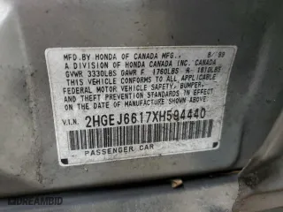1999 Honda Civic VP with VIN 2HGEJ6617XH594440, listed as a Copart auction lot 70272194 with 200,639 mi miles and Salvage Title. Bid and sale history available at carsss.com. Image 12.