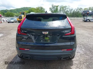 2019 Cadillac XT4 AWD Luxury z VIN 1GYFZBR41KF150209, wystawiony jako IAAI lot #42325529 z przebiegiem 76 828 mil mil oraz . Historia ofert i sprzedaży dostępna na DreamBid. Obrazek 16.