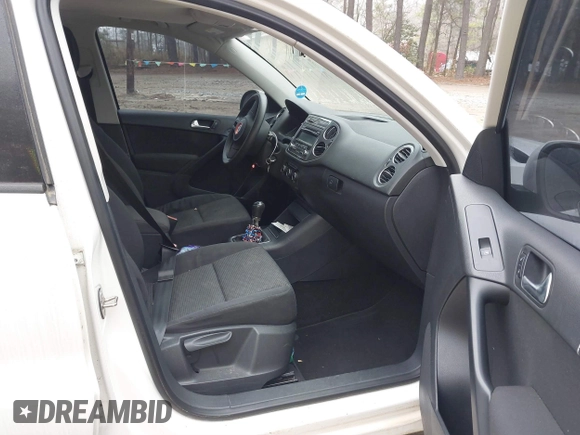 2012 Volkswagen Tiguan with VIN WVGCV7AX5CW508206, listed as a IAAI auction lot 41612007 with 116,455 mi miles and . Bid and sale history available at DreamBid. Image 5.