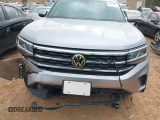 2020 Volkswagen Atlas SE z VIN 1V26C2CA5LC206661, wystawiony jako IAAI lot #41945822 z przebiegiem 43 297 mil mil oraz . Historia ofert i sprzedaży dostępna na DreamBid. Obrazek 6.