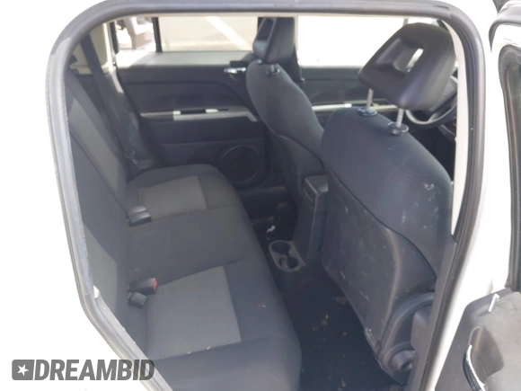 2008 Jeep Patriot Sport with VIN 1J8FT28038D647491, listed as a IAAI auction lot 42279472 with 164,527 mi miles and . Bid and sale history available at DreamBid. Image 8.