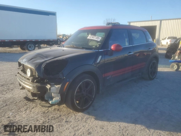 2015 MINI Countryman John Cooper Works with VIN WMWXD1C5XFWS34732, listed as a Copart auction lot 42402185 with Not Provided miles and Salvage Title. Bid and sale history available at DreamBid. Image 1.