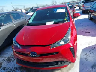 2020 Toyota Prius L Eco with VIN JTDKARFU7L3122166, listed as a IAAI auction lot 41346319 with 116,961 mi miles. Bid and sale history available at carsss.com. Image 12.
