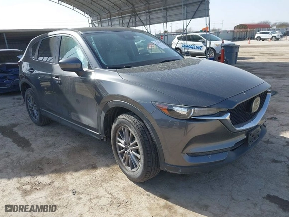 2019 Mazda CX-5 Touring with VIN JM3KFACMXK0686957, listed as a IAAI auction lot 41720338 with 95,421 mi miles. Bid and sale history available at carsss.com. Image 1.