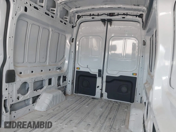 2023 Ford Transit Cargo with VIN 1FTBR1X81PKB46146, listed as a IAAI auction lot 42180262 with 75,169 mi miles and . Bid and sale history available at DreamBid. Image 19.