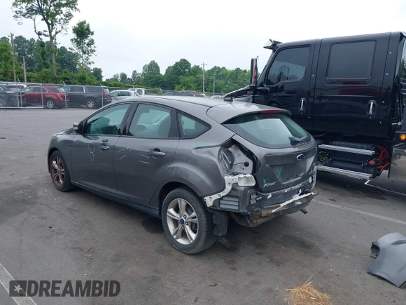 2014 Ford Focus SE with VIN 1FADP3K20EL104271, listed as a IAAI auction lot 39596262 with 81,021 mi miles. Bid and sale history available at carsss.com. Image 3.