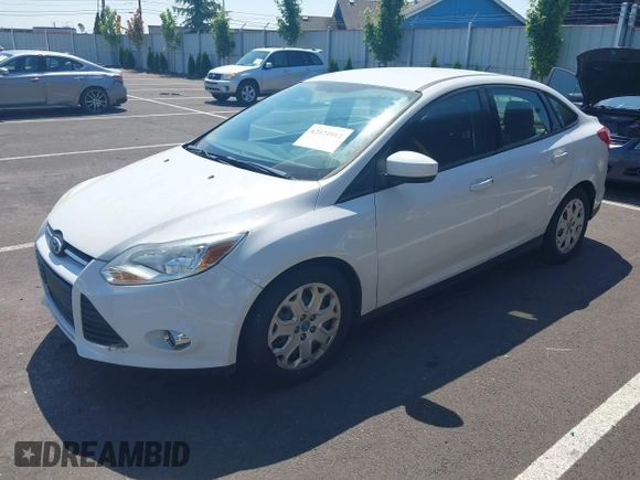 2012 Ford Focus SE with VIN 1FAHP3F26CL175855, listed as a IAAI auction lot 42574912 with 86,158 mi miles and . Bid and sale history available at DreamBid. Image 2.