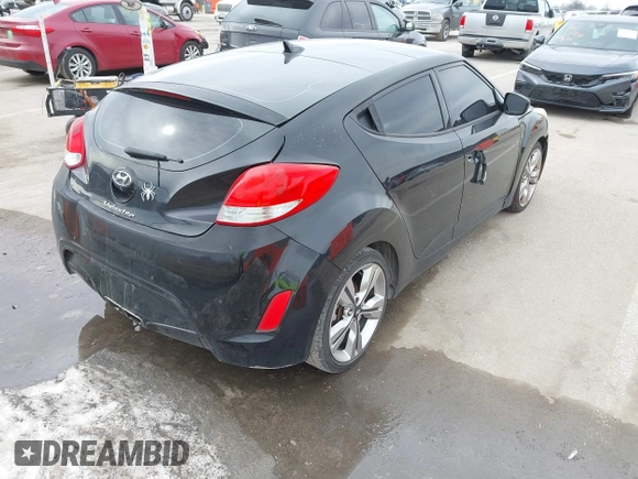2013 Hyundai Veloster w/Black Int z VIN KMHTC6ADXDU149793, wystawiony jako IAAI lot #41537953 z przebiegiem 117 635 mil mil oraz . Historia ofert i sprzedaży dostępna na DreamBid. Obrazek 4.