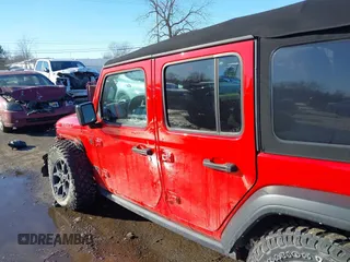 2021 Jeep Wrangler Unlimited Willys Sport with VIN 1C4HJXDG9MW754873, listed as a IAAI auction lot 41641167 with 25,410 mi miles and . Bid and sale history available at DreamBid. Image 14.