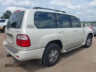 1999 Lexus LX 470 with VIN JT6HT00W5X0065846, listed as a IAAI auction lot 42142816 with 288,854 mi miles and . Bid and sale history available at DreamBid. Image 4.