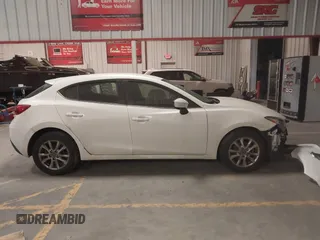 2016 Mazda 3 i Sport with VIN 3MZBM1K77GM280856, listed as a IAAI auction lot 41647540 with 97,190 mi miles and . Bid and sale history available at DreamBid. Image 13.